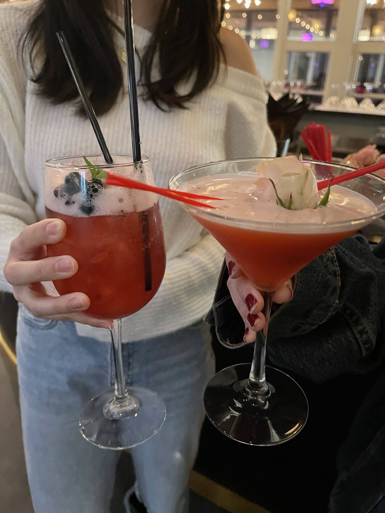 Berry drinks with floral garnish