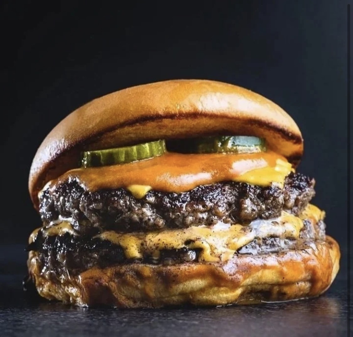 Double cheeseburger with pickles
