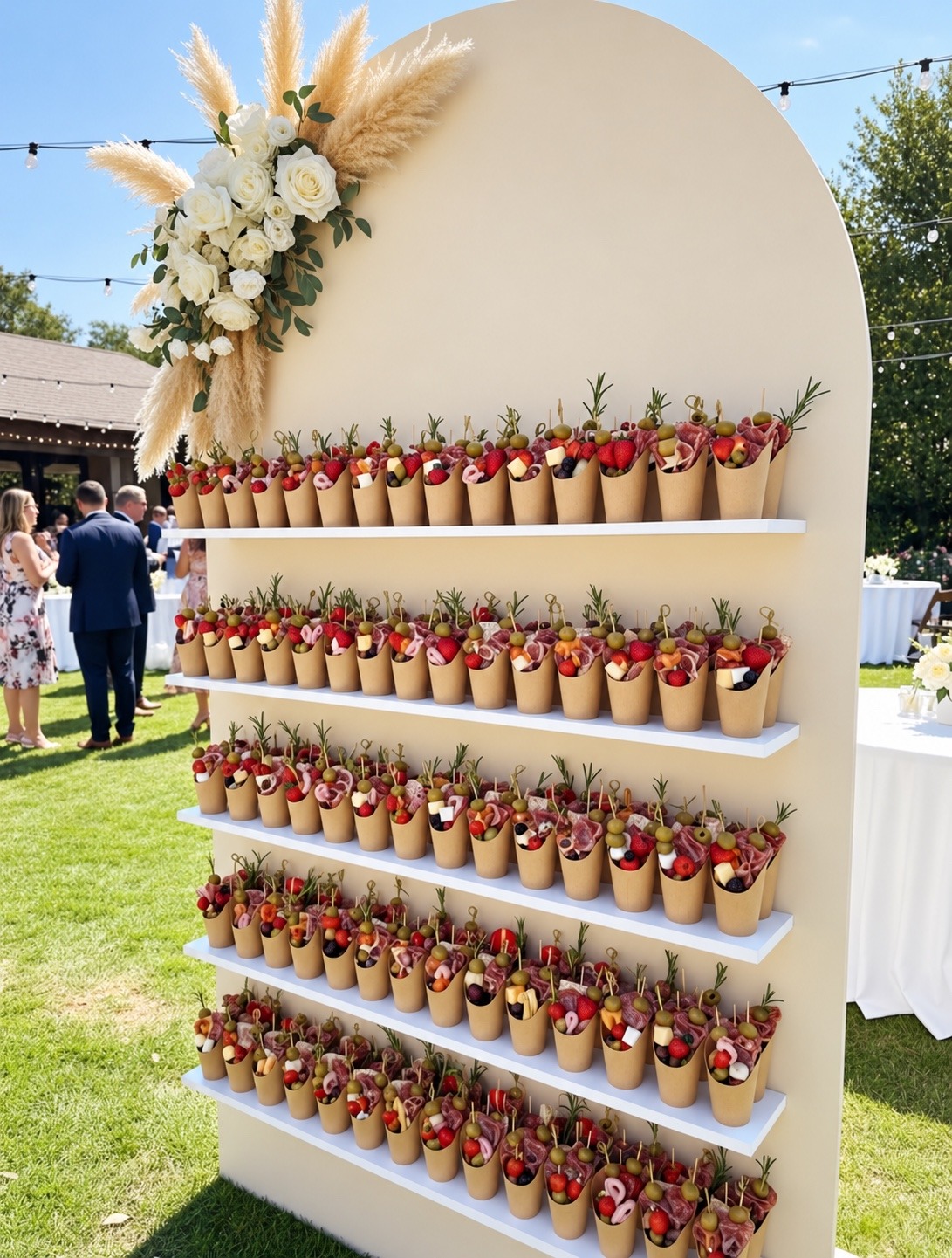 Fresh fruit cones on an elegant display wall