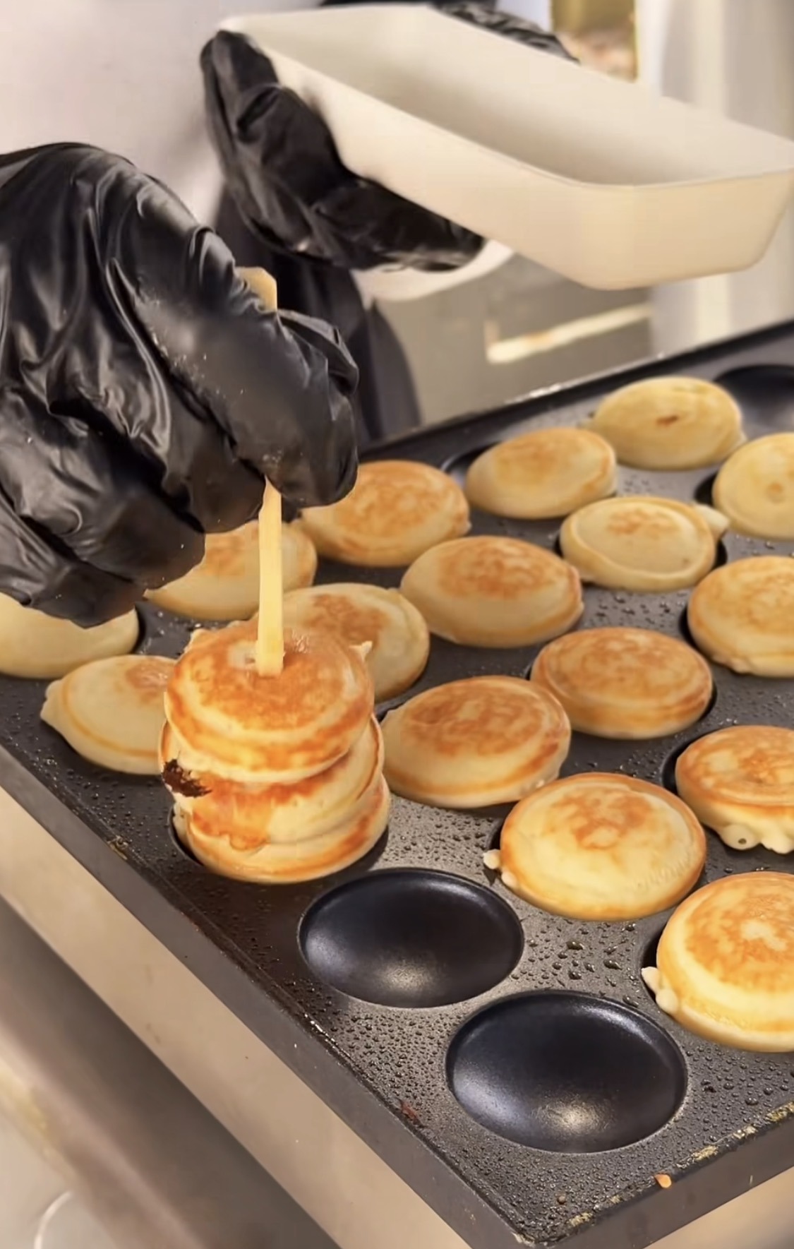 Mini pancakes prepared at a live station