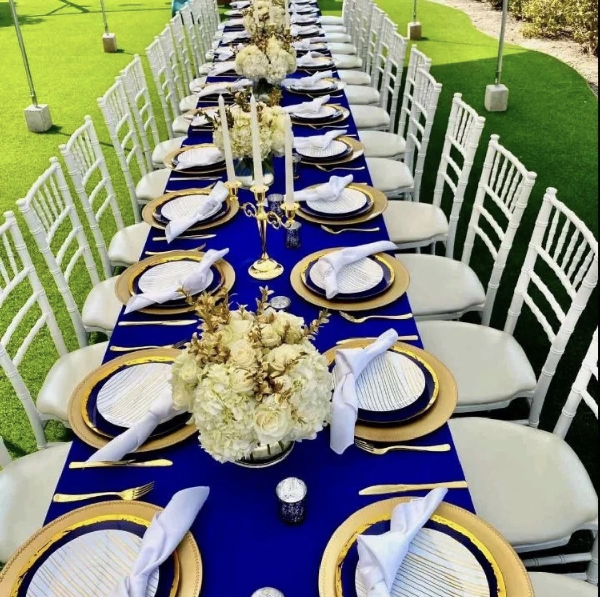 Royal blue garden table with gold accents