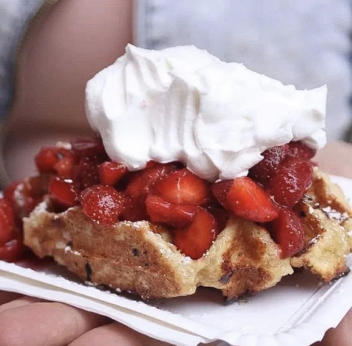 Strawberry waffle with whipped cream